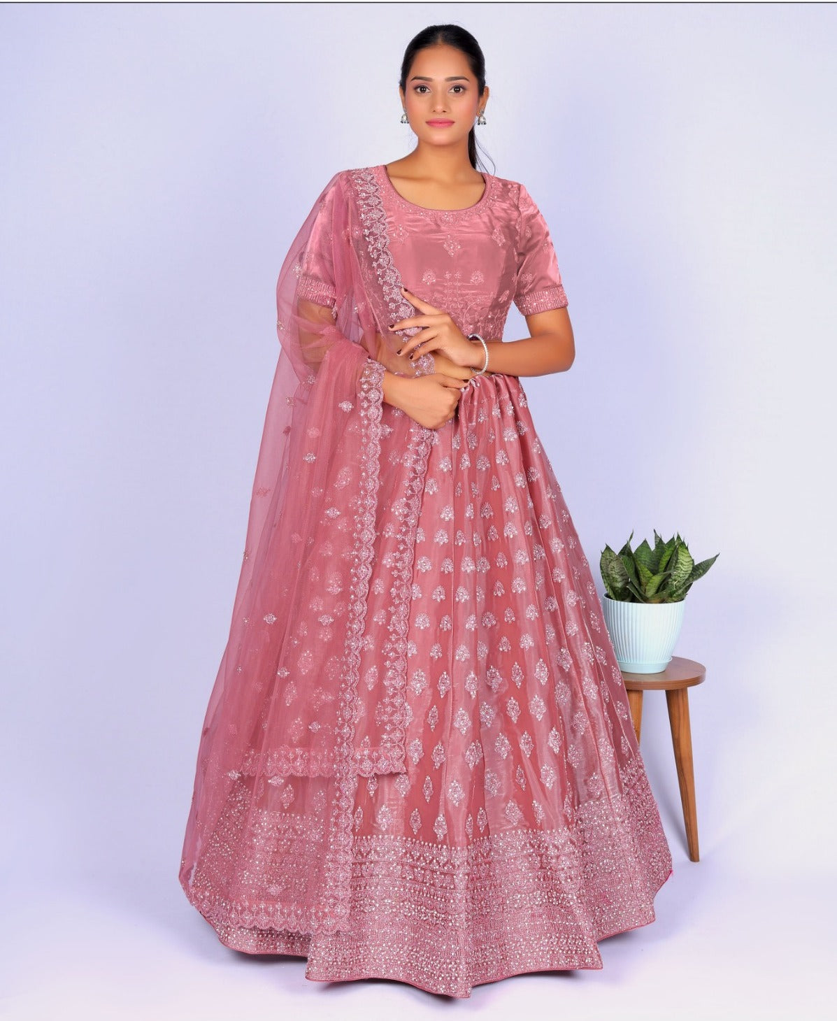 New Semi Stitiched Netted Lehenga Choli